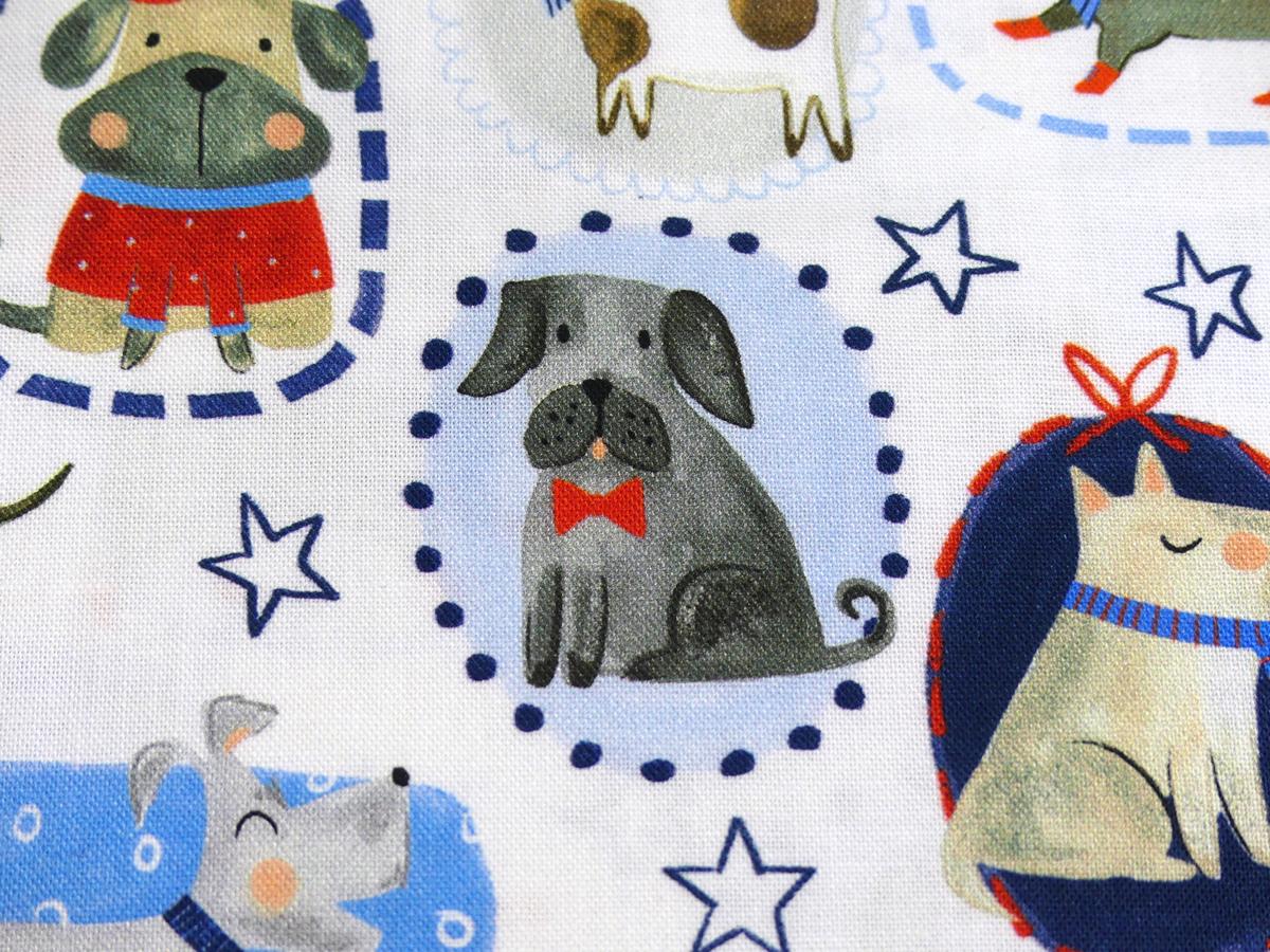 Patchworkstoff mit Hunden und Zicklein von Timeless Treasures grauer Hund mit roter Schleife